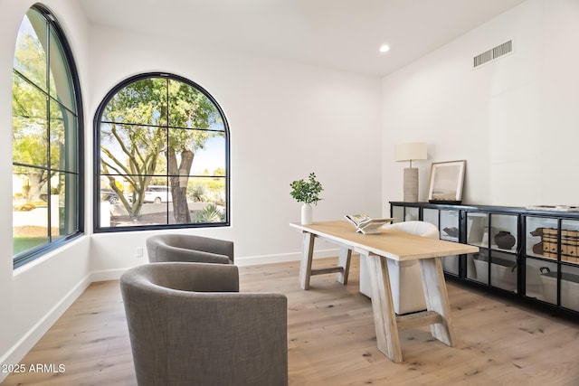 office area featuring recessed lighting, baseboards, visible vents, and light wood-type flooring