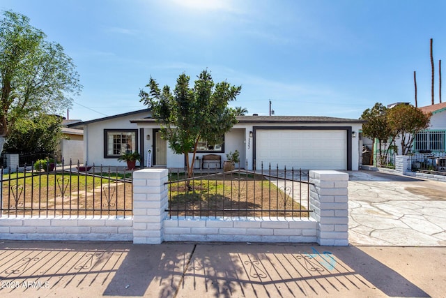 ranch-style home featuring a garage