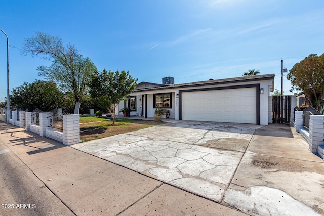 single story home with a garage