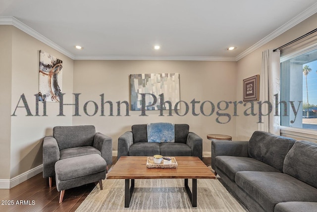 living room with crown molding, plenty of natural light, and hardwood / wood-style floors