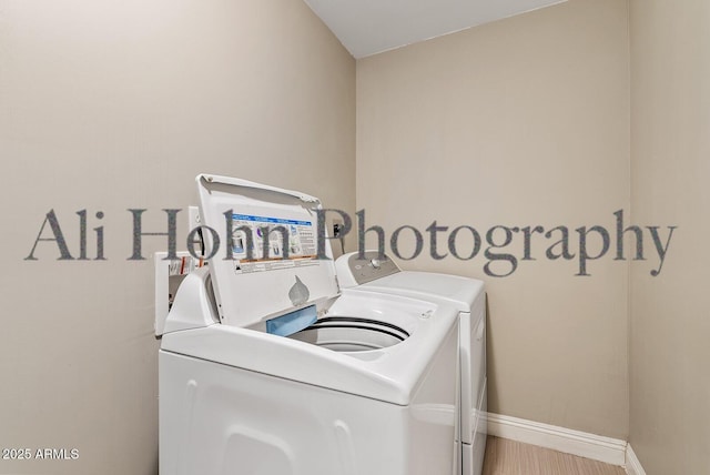 washroom featuring independent washer and dryer