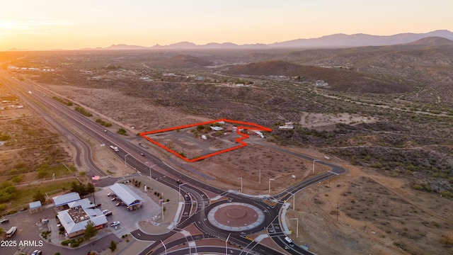 2315 N US Highway 93, Wickenburg, AZ 85390 - aerial view of sparsely populated area with mountains and property parcel outlined