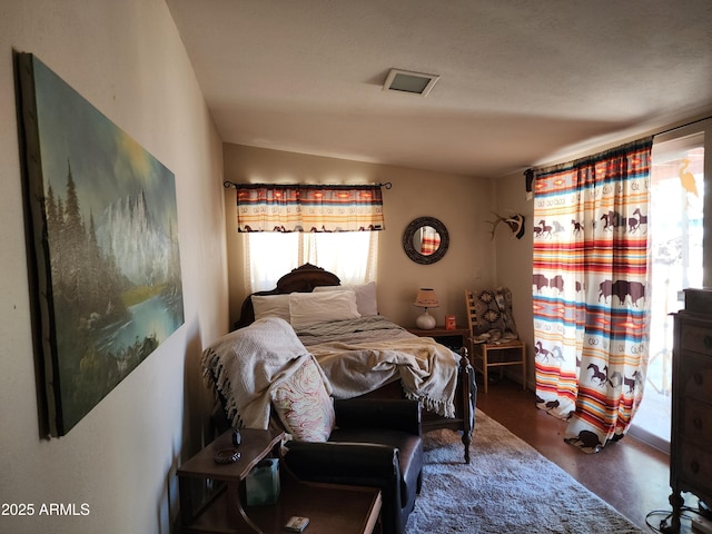 2315 N US Highway 93, Wickenburg, AZ 85390 - bedroom with concrete flooring and multiple windows