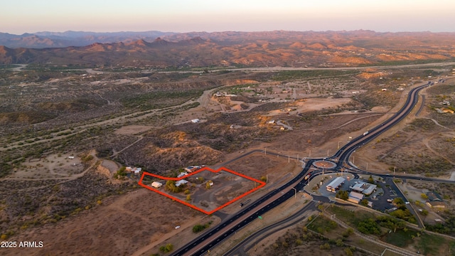 2315 N US Highway 93, Wickenburg, AZ 85390 - aerial overview of property's location featuring mountains and property boundaries highlighted