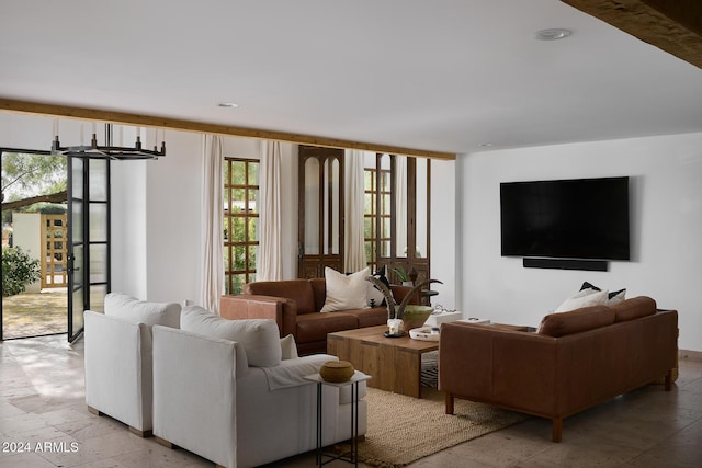 living room featuring an inviting chandelier