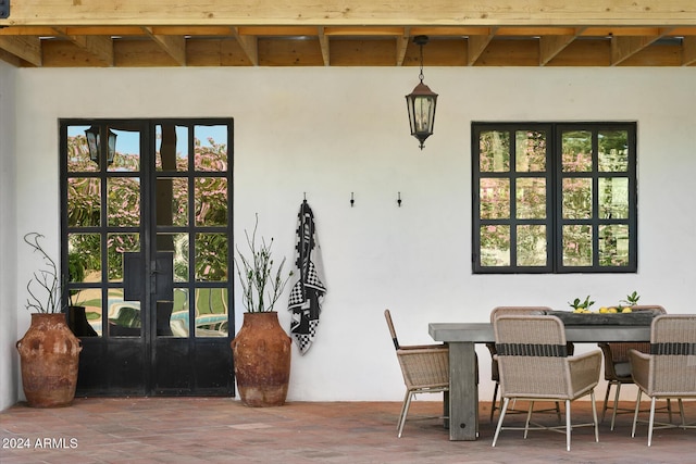 dining space with a wealth of natural light and french doors