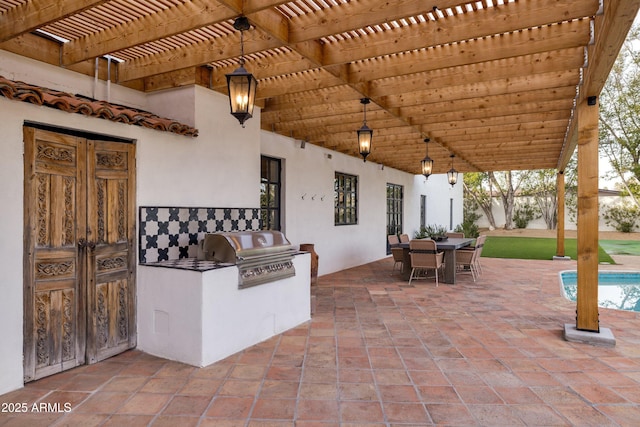 view of patio / terrace with an outdoor kitchen, a grill, and a pergola