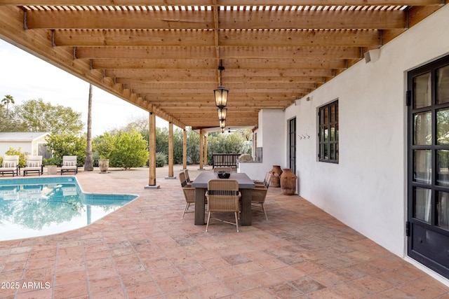 view of pool featuring a patio area and a pergola