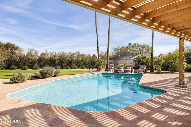 view of pool featuring a patio area and a pergola