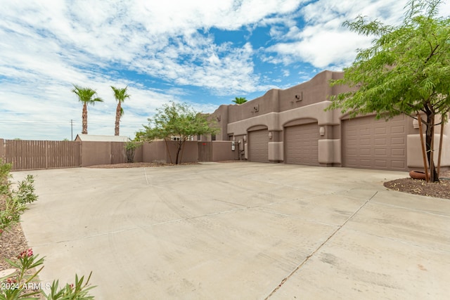 view of patio / terrace featuring a garage