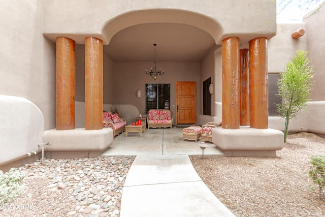 doorway to property featuring a patio area