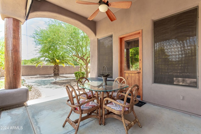 view of patio featuring ceiling fan