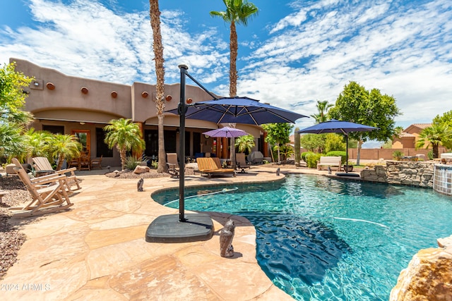 view of pool with a patio