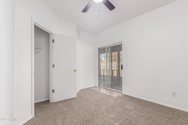 interior space featuring a closet, ceiling fan, and carpet