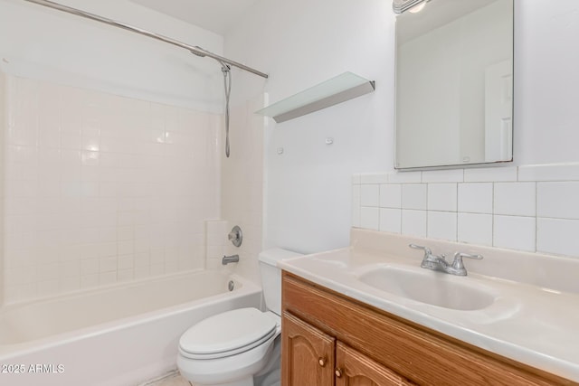 full bathroom featuring decorative backsplash, toilet, vanity, and bathing tub / shower combination