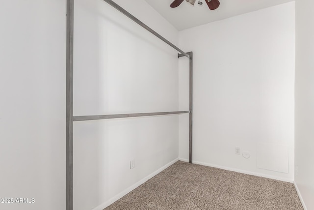 carpeted empty room with ceiling fan