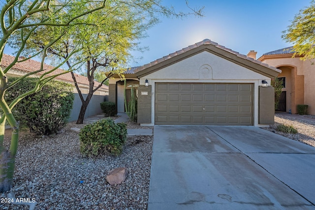 view of front of home with a garage