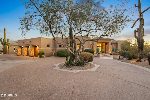 view of pueblo revival-style home