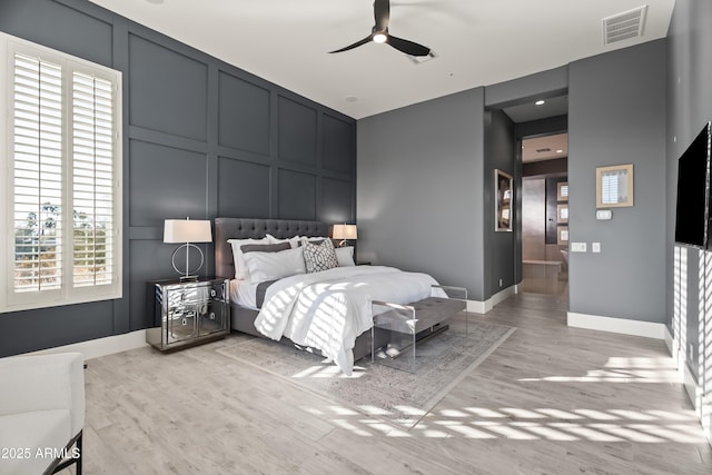 bedroom featuring ceiling fan and light wood-type flooring