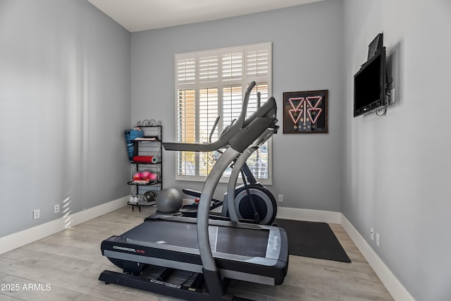 exercise area featuring light wood-type flooring