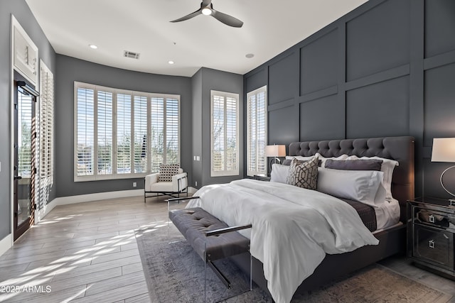 bedroom featuring ceiling fan and light wood-type flooring