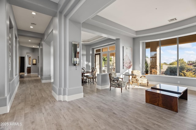 interior space featuring french doors and light hardwood / wood-style flooring