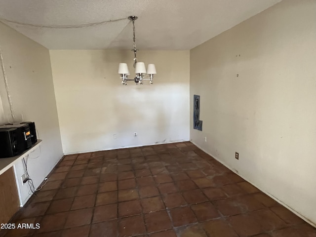 8063 N 31st Ln, Phoenix, AZ 85051 - unfurnished dining area featuring a chandelier