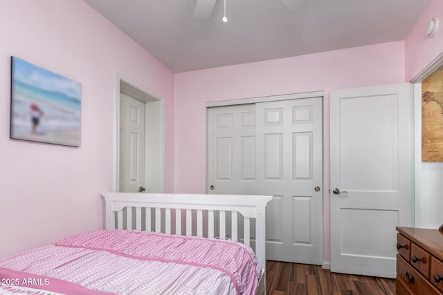 bedroom featuring a closet, ceiling fan, and dark hardwood / wood-style flooring