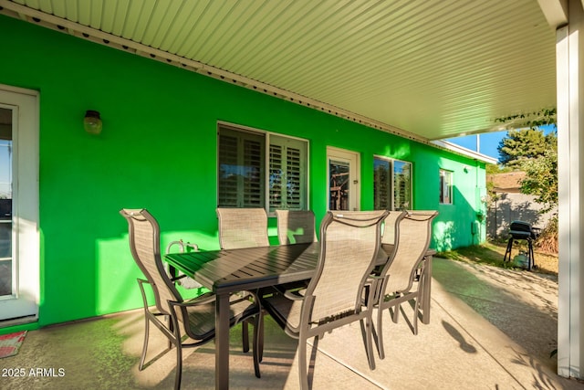 view of patio with a grill