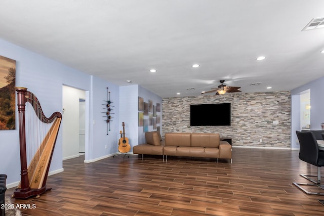 living room with ceiling fan