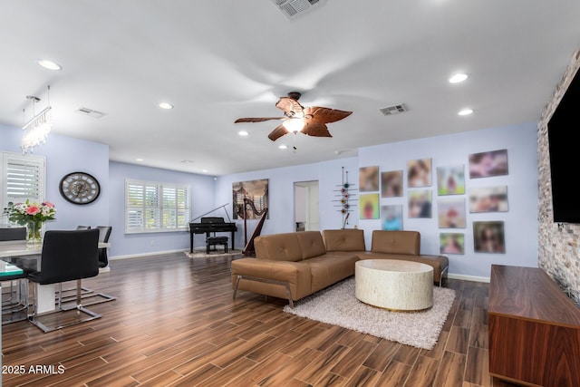 living room with ceiling fan