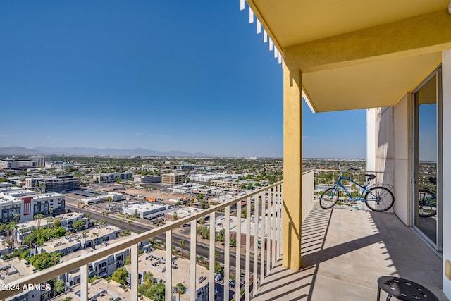 balcony featuring a mountain view