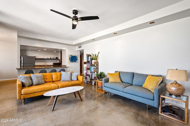 207 W Clarendon Ave Unit 20B, Phoenix, AZ 85013 - living room with a ceiling fan, finished concrete flooring, baseboards, and visible vents