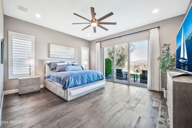 bedroom with wood-type flooring, access to outside, and ceiling fan