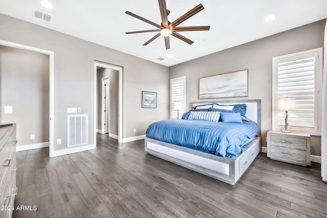 bedroom featuring hardwood / wood-style floors and ceiling fan