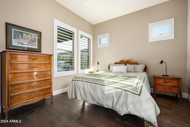 bedroom featuring ceiling fan and dark wood-type flooring