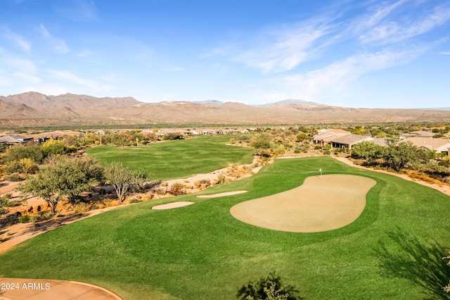 surrounding community with a mountain view