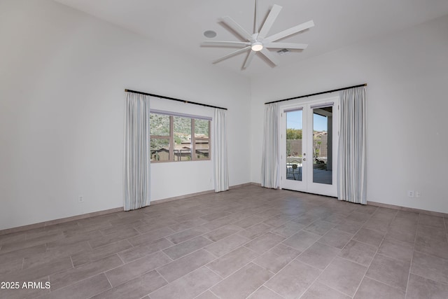 12770 N 145th Way, Scottsdale, AZ 85259 - empty room featuring visible vents, ceiling fan, plenty of natural light, and baseboards