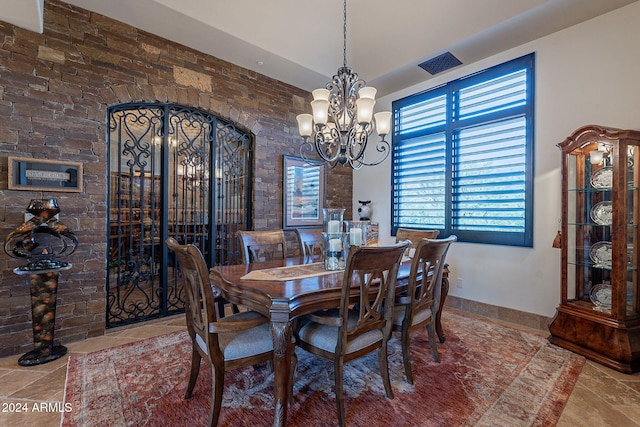 dining area with a notable chandelier