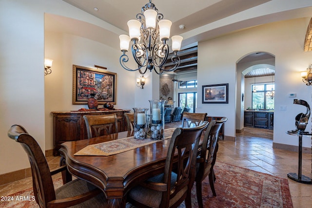 dining area featuring a chandelier