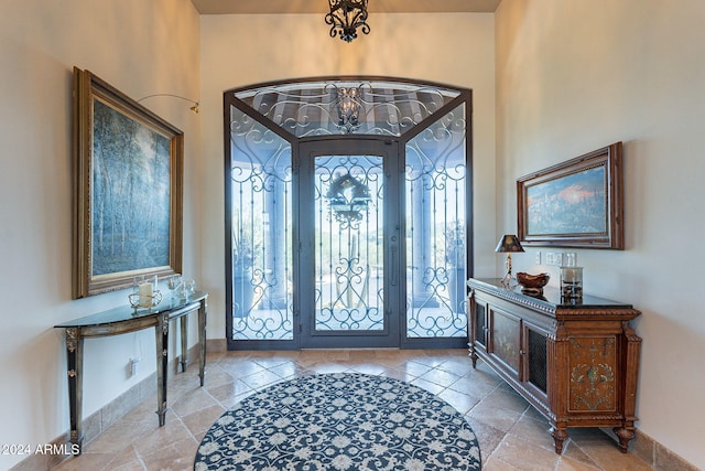 entrance foyer with a chandelier