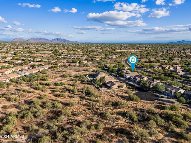 bird's eye view with a residential view and a mountain view