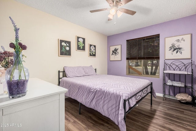 20053 N 15th Dr, Phoenix, AZ 85027 - bedroom featuring a textured ceiling, dark wood-style floors, and a ceiling fan