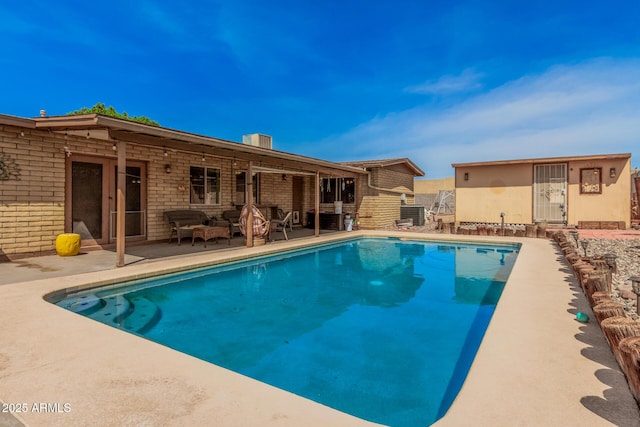 20053 N 15th Dr, Phoenix, AZ 85027 - view of swimming pool with an outbuilding, a fenced in pool, and a patio area