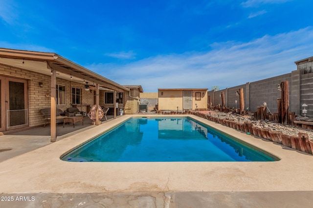 20053 N 15th Dr, Phoenix, AZ 85027 - view of pool featuring a fenced backyard, an outdoor structure, a patio, and a fenced in pool