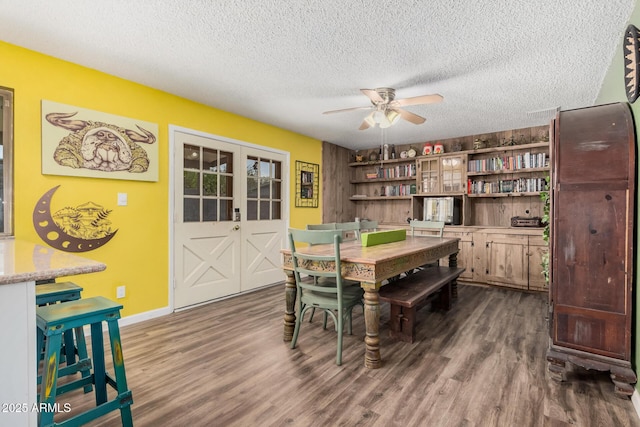 20053 N 15th Dr, Phoenix, AZ 85027 - dining room with dark wood-style floors, a textured ceiling, baseboards, and a ceiling fan