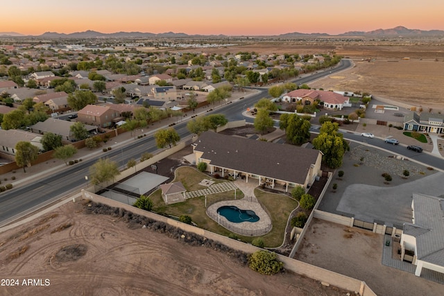 aerial view at dusk with a mountain view