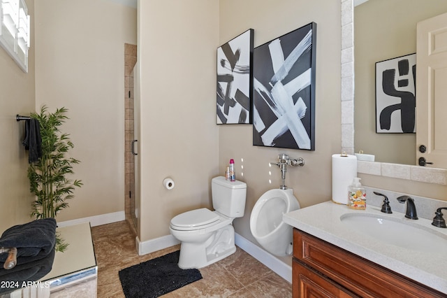 bathroom featuring vanity, toilet, and walk in shower