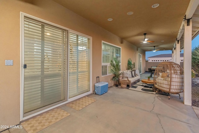 view of patio / terrace featuring ceiling fan and an outdoor hangout area