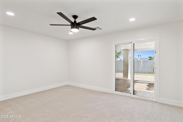 6761 E Juniper Ave, Scottsdale, AZ 85254 - empty room featuring visible vents, baseboards, ceiling fan, and light colored carpet